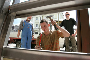 Kościan, Rynek godz. 10.29. Zenon Skrzypek, Tomasz Przymuszała i Jakub Szuster z firmy 