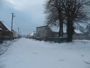 Kasprzak Aleksandra. Ul. Łowiecka w Jerce w zimowej szacie